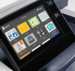 Close-up touch screen of the Xerox multifunction colour printer, displaying interactive icons for functions such as copying, email, faxing and more, illustrating Xerox's intuitive user interface and state-of-the-art technology.